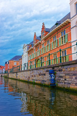 Naklejka premium Guildhalls on Graslei and Korenlei over Lys River Ghent