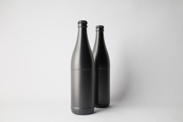 Two beer bottles on the scene, mock-up.