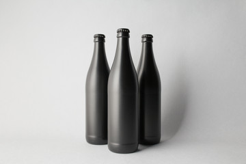 Three beer bottles on the scene, mock-up.