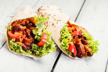 Tortilla with mincemeat and beans