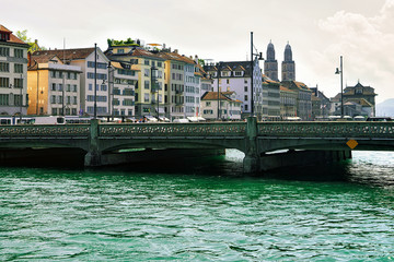 Bridge at Limmatquai and Grossmunster Church Zurich