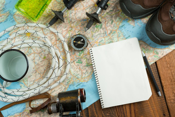 A set of things for hiking in the mountains. Collects everything necessary for a hiking trip. Top view. extreme sport theme © Iryna&Maya