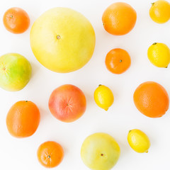 Grapefruit and lemon, orange and sweetie on white background. Flat lay, top view. Food background