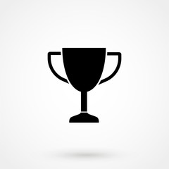 Trophy cup vector icon eps 10. Simple winner symbol. Black illustration isolated on grey background.