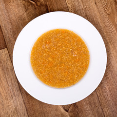Vegetable soup on a wooden table