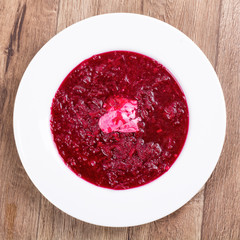 Vegetable soup on a wooden table