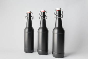 Three beer bottles on the scene, mock-up.