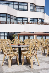 Patio with brown chairs