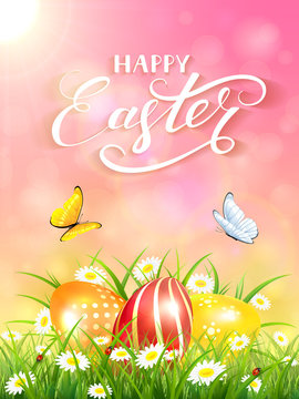Pink background with butterflies and three Easter eggs in grass