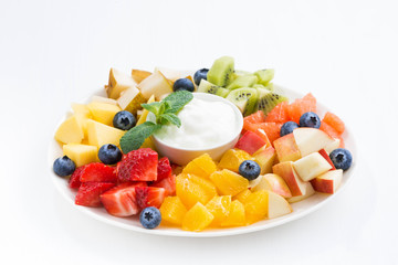 ingredients for fruit salad and natural yoghurt