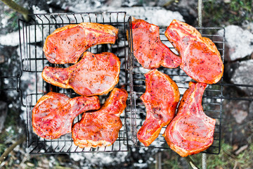 Flames on a Barbecue grill with lot of charcoal
