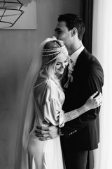 Wedding black and white photo of the bride and groom