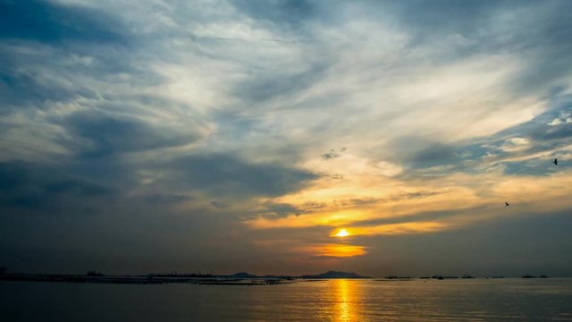 4K Time lapse sunset sky at sea with Si Chang island