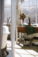 Interior of a vintage bathroom with freestanding bathtub