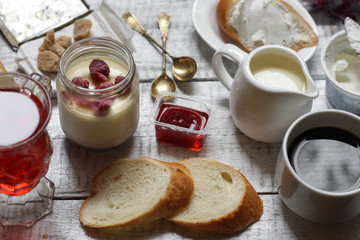  A light breakfast (or snack) - a loaf, yogurt, berries, cheese, jam and other