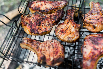 Flames on a Barbecue grill with lot of charcoal