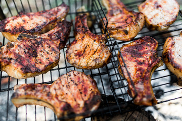 Flames on a Barbecue grill with lot of charcoal