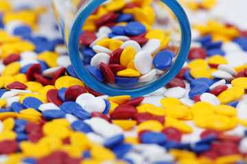 Colorful plastic polymer granules on white