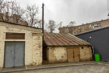 Old small outbuilding of economic purpose in the city