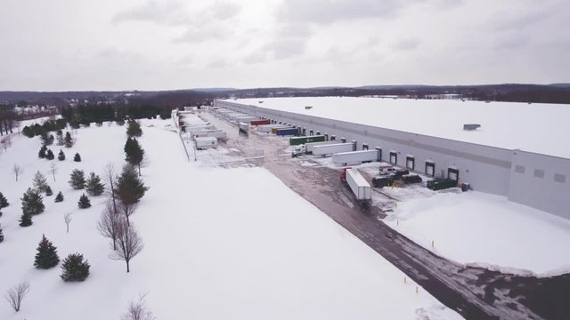 Aerial view of warehouse lot in winter