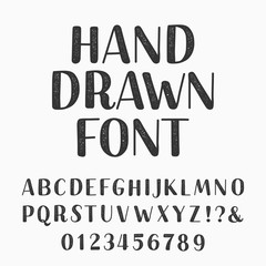 Hand drawn typeset. Alphabet vector font. Type letters and numbers on a dark background. Vector typeface for your design.