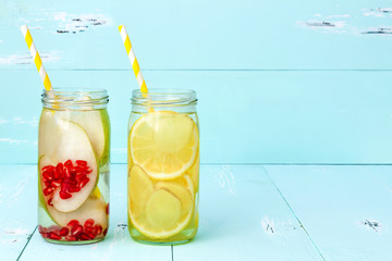 Detox fruit infused flavored water. Refreshing summer homemade cocktail. Clean eating. Copy space