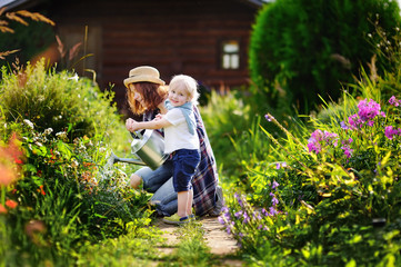 Cute toddler boy and his mat summer sunny day
