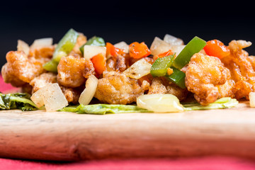 wok fried chicken stir fry with sweet peppers and chinese vegetables