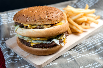 Cheese burger - American cheese burger with Golden French fries