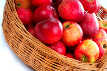Fototapeta na wymiar Basket with red apples - 2