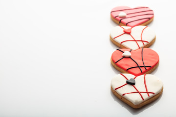 Heart shaped biscuits on white background