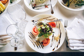 Dish with food on the banquet table