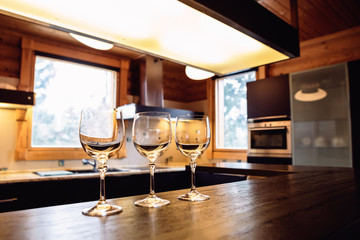 Empty wine glasses on the house kitchen