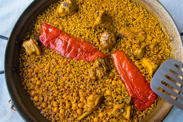 Paella, a typical Spanish dish with rice of mediterranean food from Valencia
