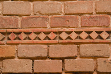 Close up of old red brick wall
