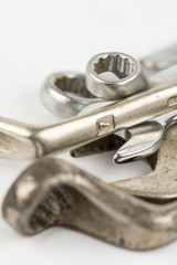 Old used wrench tools isolated over white background with copy space