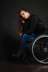Fototapeta na wymiar Sad girl on wheelchair.