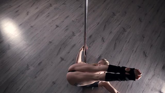Girl dancing lap dance, beautiful woman doing pole dance, female dancer, fitness and sport.