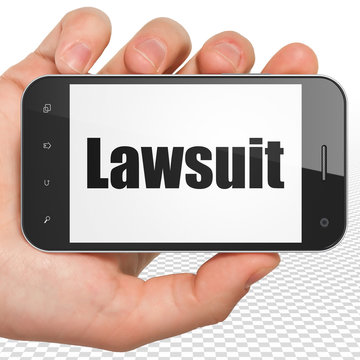 Law concept: Hand Holding Smartphone with Lawsuit on display