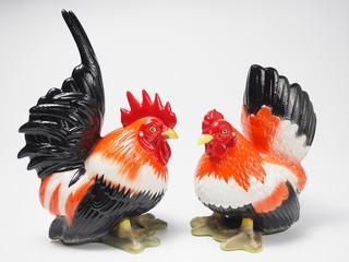 Sweetheart color bantam ceramic dolls on white background