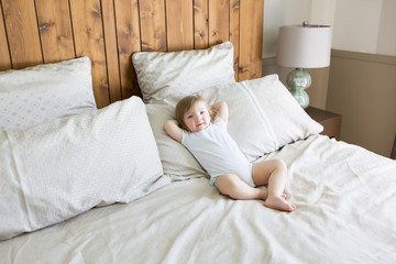 little cute baby girl on the bed