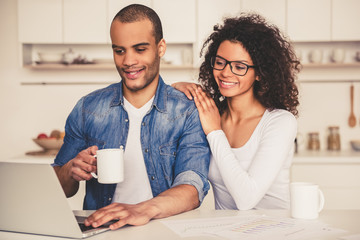 Afro American couple in kitchen