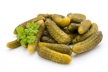 Marinated pickled cucumbers isolated on the white.