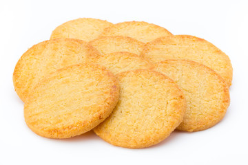 Stacked short pastry cookies isolated on white background.