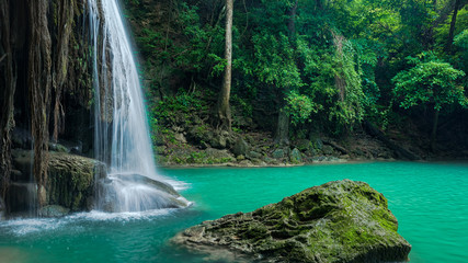 Fototapeta na wymiar Green nature with green waterfall landscape, Erawan waterfall located Khanchanaburi Province, Thailand
