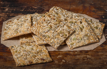 Cookies with seeds  on vintage wooden background