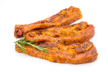 Spicy marinated spare ribs barbecued on the white background.