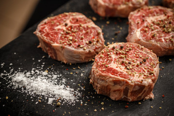 Raw meat steaks