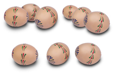 Collection of handmade traditional eggs on white background