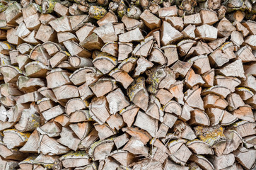 Chopped firewood stacked in rows
